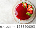 Elegant strawberry mirror glaze cake with mint 123390893