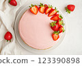 Strawberry cake with smooth pink glaze 123390898