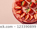 Strawberry cake with glossy pink icing 123390899