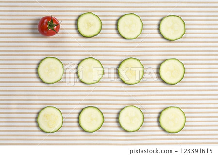 Tomato Amongst Courgette Slices, Food Photography 123391615