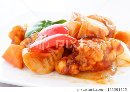 Healthy Chinese sweet and sour pork with plenty of vegetables such as onions, carrots, and green peppers. Healthy Chinese sweet and sour pork with plenty of vegetables such as onions, carrots, and green peppers. 123391825