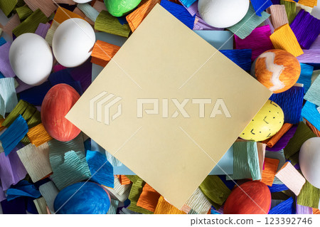 Happy Easter. Blank card amidst colorful Easter eggs for an Easter greeting card. 123392746
