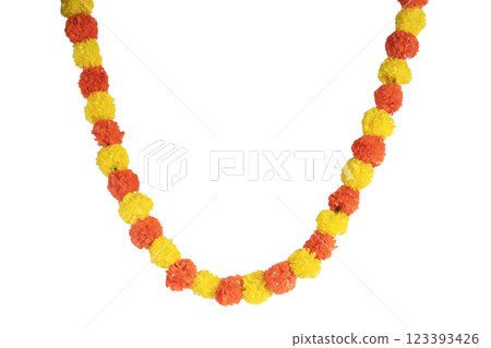 Colorful artificial marigold flower garland for festive and decorative celebrations. 123393426