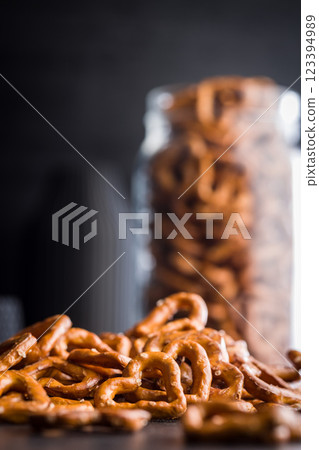 Heart shaped pretzel on black table. Heart shaped pretzel on black table. 123394989