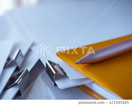 Documents and notebook on the table Documents and notebook on the table 123395885