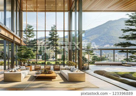 Sunlit modern living room with panoramic mountain views and greenery 123396889