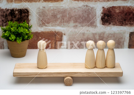 1:3 peg dolls on a seesaw 123397766