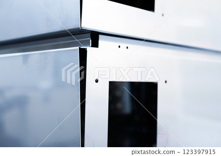 Cut metal parts for various industries. Many identical metal products. 123397915