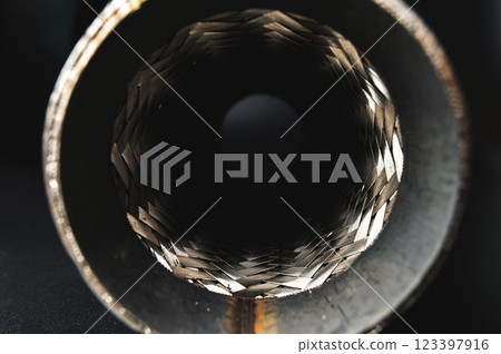 Close-up Selective focus picture with noise effect of exhaust pipe flexible connector 123397916