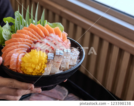 Sashimi Sushi Set on Plate Delicious sashimi bowl with fresh fish and octopus. 123398138
