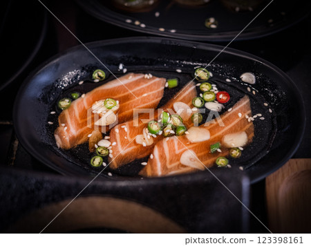 Salmon raw pickled in shoyu sauce or soy sauce 123398161