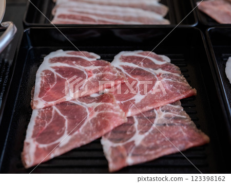 Sliced beeff or shabu or Japanese hot pot on black tray 123398162