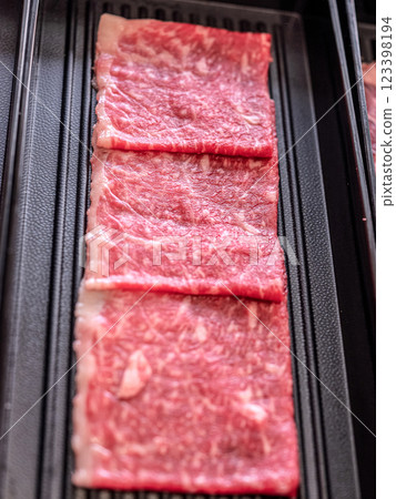 Premium Wagyu Beef Slices with Perfect Marbling Premium Wagyu Beef Slices with Perfect Marbling 123398194