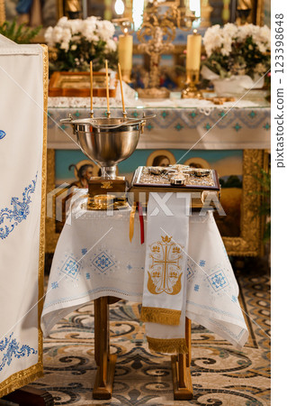 Sacred Altar Setup in a Beautiful Church Interior During a Religious Ceremony Sacred Altar Setup in a Beautiful Church Interior During a Religious Ceremony 123398648