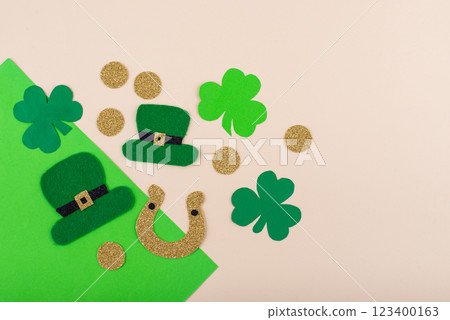 St. Patrick's Day concept with leprechaun hat, gold coins and horseshoe St. Patrick's Day concept with leprechaun hat, gold coins and horseshoe 123400163