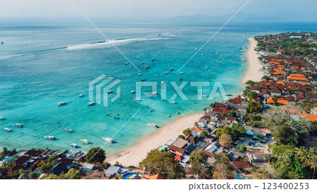 Nusa Lembongan with tropical coastline and turquoise ocean with boats, drone view Nusa Lembongan with tropical coastline and turquoise ocean with boats, drone view 123400253