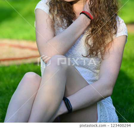 Young Woman in White Dress Posing at Sunset Young Woman in White Dress Posing at Sunset 123400294