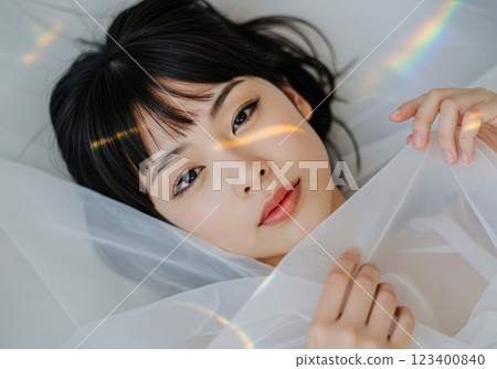 A fantastical Japanese woman wrapped in a chiffon veil (AI-generated image) 123400840