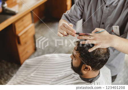 A Modern Haircut Experience in a Professional Barbershop Setting Focused on Style and Confidence A Modern Haircut Experience in a Professional Barbershop Setting Focused on Style and Confidence 123401208