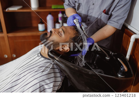 Indulging in an Amazing and Relaxing Hair Wash Experience at a Chic and Modern Salon Indulging in an Amazing and Relaxing Hair Wash Experience at a Chic and Modern Salon 123401218
