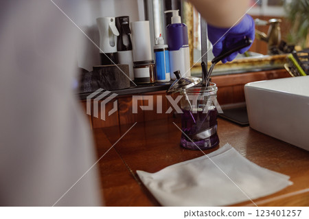 Conducting experiments with a purple solution in a lab to achieve significant results Conducting experiments with a purple solution in a lab to achieve significant results 123401257