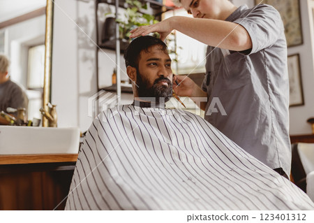 Witnessing Modern Barbering in Action A Stylish Haircut Experience at a Trendy Salon Witnessing Modern Barbering in Action A Stylish Haircut Experience at a Trendy Salon 123401312