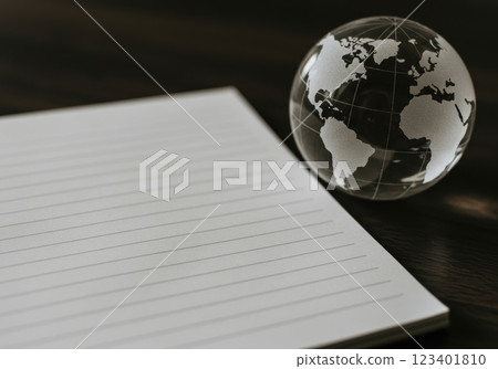 Blank notebook and glass globe (AI-generated image) 123401810