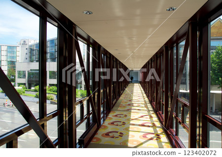 Mainz, Germany, July 8, 2017: Glass Skywalk Connecting Two Luxury Hotel Buildings Mainz, Germany, July 8, 2017: Glass Skywalk Connecting Two Luxury Hotel Buildings 123402072