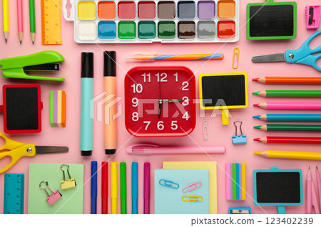 Different stationery on pink background. Back to school 123402239