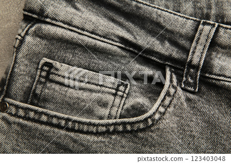Grey front jeans pocket, old jeans close-up. Macro Grey front jeans pocket, old jeans close-up. Macro 123403048