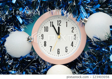 New Year's clock decorated with christmas ball. Celebration Concept for New Year Eve. 123403056