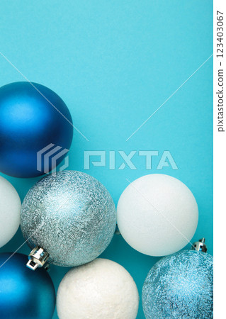 Christmas composition. Christmas blue and white balls on blue background. Christmas composition. Christmas blue and white balls on blue background. 123403067
