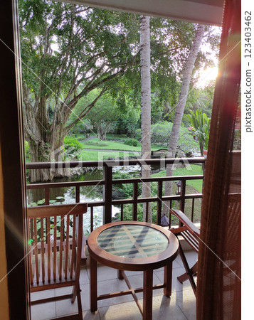 Cozy wooden house balcony with with tropical tree, Bali, Indonesia 123403462