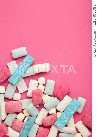 Different chewing gums on yellow background. Space for text. Vertical photo 123403785
