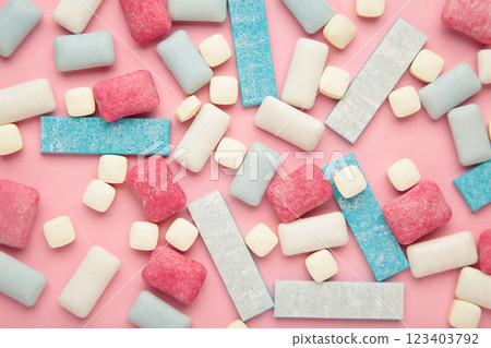 Different chewing gums on pink background. Different chewing gums on pink background. 123403792