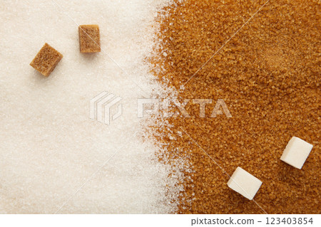 Background of brown and white sugar. Space for text. Background of brown and white sugar. Space for text. 123403854