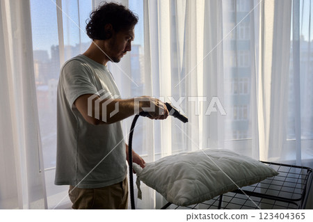 Steam Cleaning in Progress We Are Freshening Up Your Bedding for a Cozy Experience 123404365