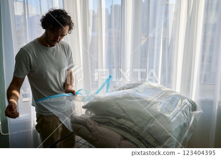 Vacuum Sealing Clothes Effectively for Storage, Preservation, and Space Saving Solutions 123404395