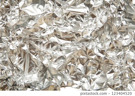 Texture of crumpled aluminium foil. Space for text 123404520