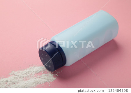 Baby powder on pink background. Baby cosmetics. Space for text Baby powder on pink background. Baby cosmetics. Space for text 123404598