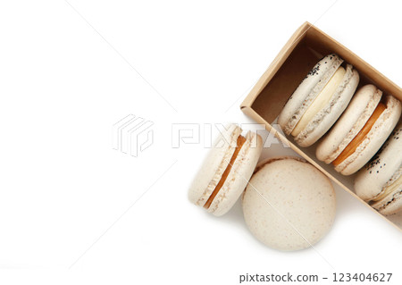 Pastel macaroons in box isolated on white background 123404627