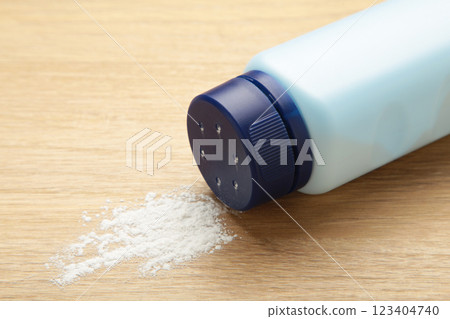 Baby powder on light background. Baby cosmetics. Space for text Baby powder on light background. Baby cosmetics. Space for text 123404740