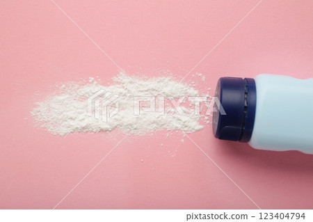 Baby powder on pink background. Baby cosmetics 123404794