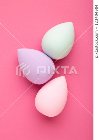 Beauty blender on pink background. Bright sponges for make-up cosmetics. Beauty blender on pink background. Bright sponges for make-up cosmetics. 123404984