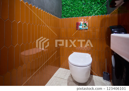 This is a Modern Bathroom that features a Stylish Design along with Gorgeous Green Accents 123406101
