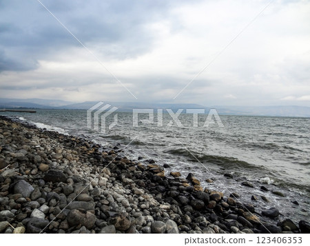 Rocky shore of the sea or lake.The sea of Galilee also called Lake Tiberias or Kinneret, Israel. Rocky shore of the sea or lake.The sea of Galilee also called Lake Tiberias or Kinneret, Israel. 123406353