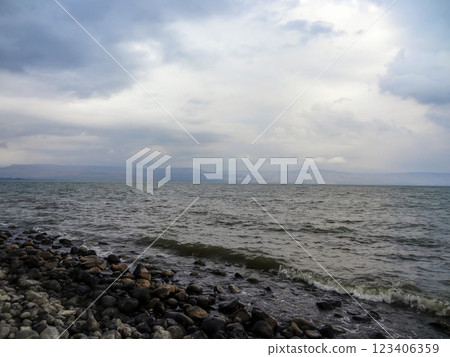 Rocky shore of the sea or lake.The sea of Galilee also called Lake Tiberias or Kinneret, Israel. Rocky shore of the sea or lake.The sea of Galilee also called Lake Tiberias or Kinneret, Israel. 123406359