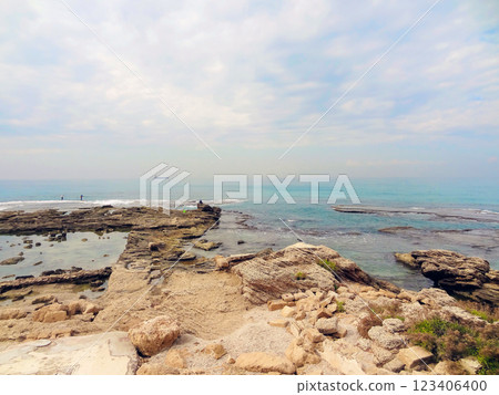 Rocky coast near the ancient Caesarea national park on the Mediterranean coastline, Israel. Rocky coast near the ancient Caesarea national park on the Mediterranean coastline, Israel. 123406400