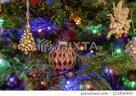 Christmas tree decorated with balls and gerland. 123406405