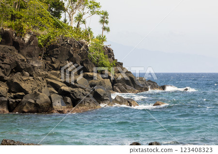 Rocky natural coastal landscape bathed by the Indian Ocean, on the island of Pulau Weh, in Sumatra, Indonesia 123408323